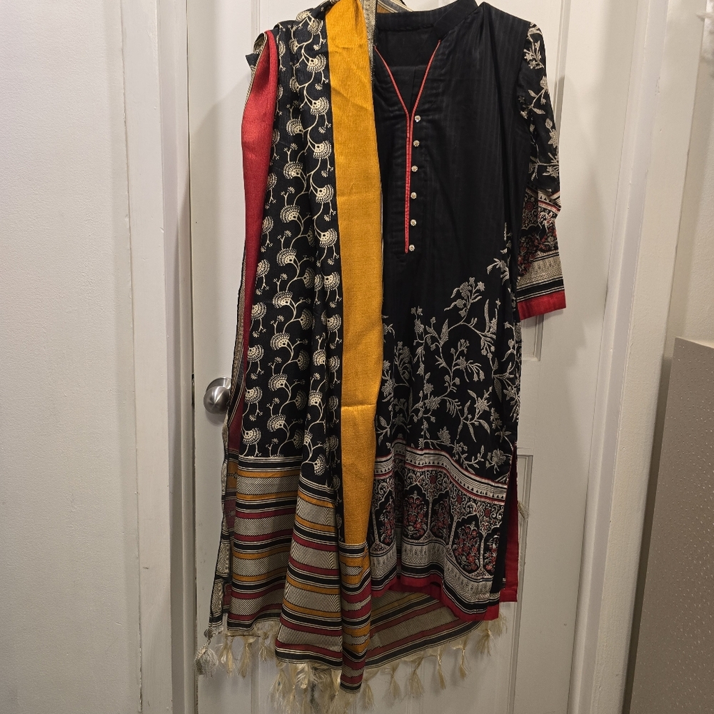 Alkaram Black and Red 3 Piece Suite In Size M/L.